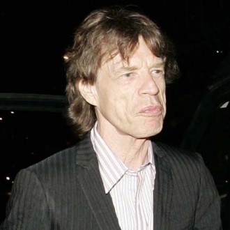 mick-jagger-having-fun-with-new-rolling-stones-material-2