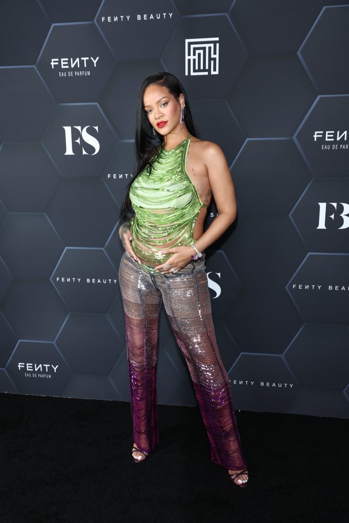Rihanna poses for a picture as she celebrates her beauty brands fenty beauty and fenty skin at Goya Studios on February 11, 2022 in Los Angeles, California